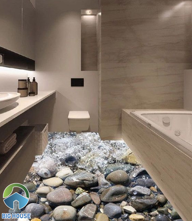 Thiết kế sàn phòng tắm có hình những viên sỏi đá ngổn ngang có dòng nước chảy qua, đem lại cảm giác mộc mạc, gần gũi với thiên nhiên